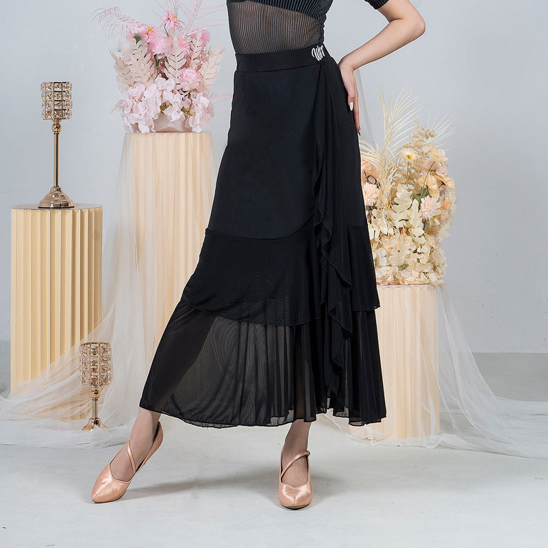 Black ballroom practice skirt with wrap front and pleated mesh hem, hip and hem view