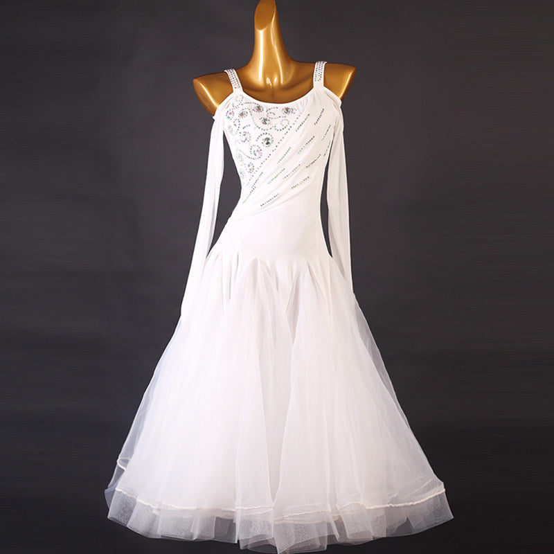 White ballroom competition dress with a diagonal rhinestone band and tulle skirt