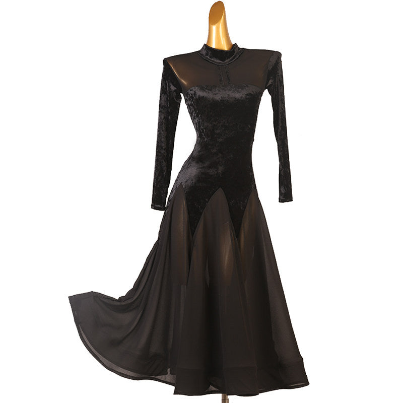 Black velvet ballroom dance dress with chevron panel skirt and mesh shoulder inserts