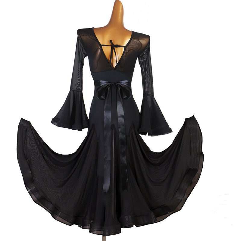 Black bell sleeve ballroom practice dress with satin sash, skirt swept out
