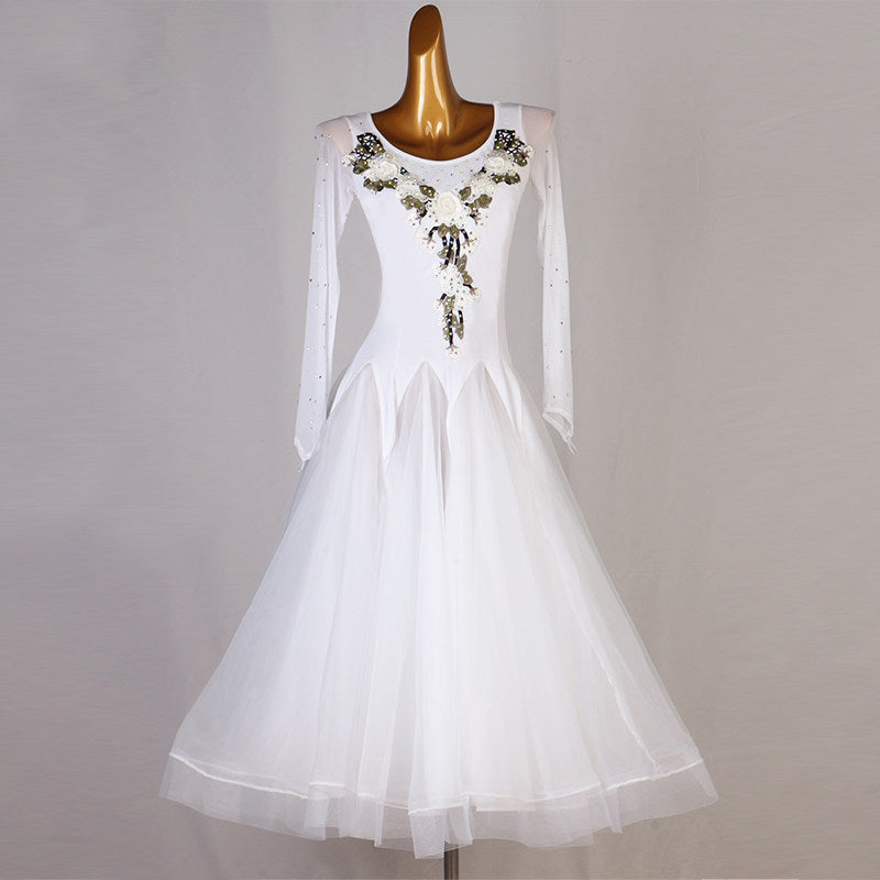White ballroom competition dress with ivory floral applique at the neckline