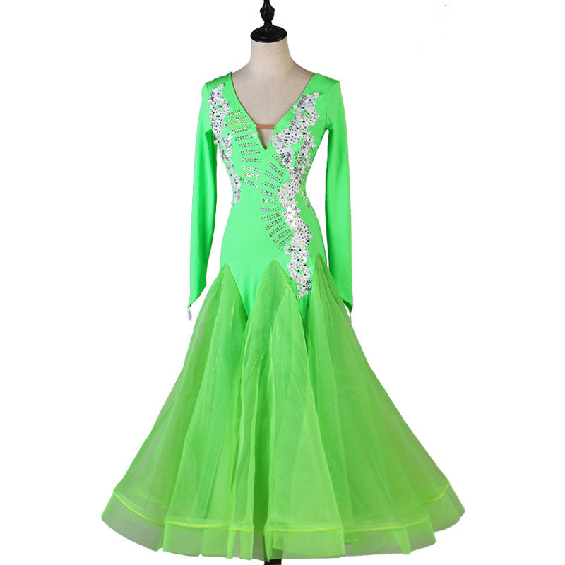 Green ballroom competition dress with pearl studded ivory lace applique bodice