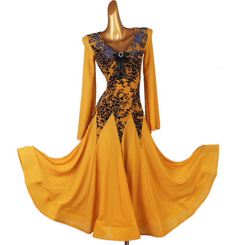 Golden ballroom dance dress with black lace applique bodice and chiffon bell sleeves