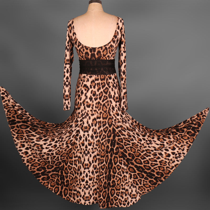 Leopard print ballroom practice dress with the skirt swept out to show the fishtail hem