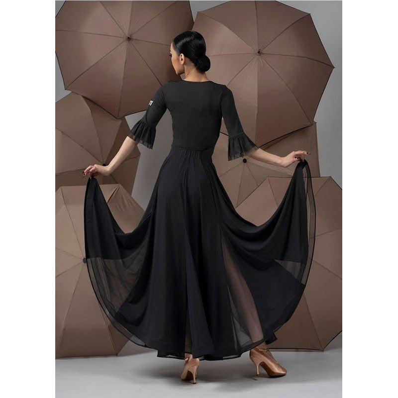 Back view of the black full circle chiffon ballroom dance skirt held open to show the mesh godets