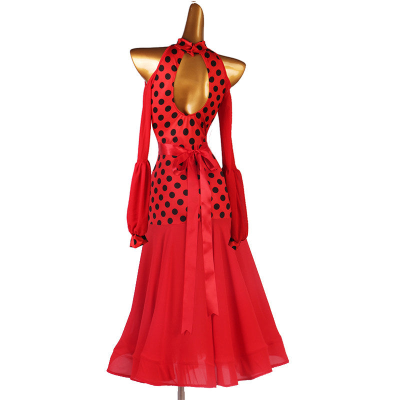 Red polka dot ballroom dress back view with satin sash tied over the open back