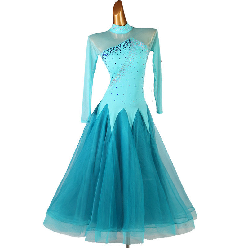 Turquoise ballroom competition dress with rhinestone sash and mesh long sleeves
