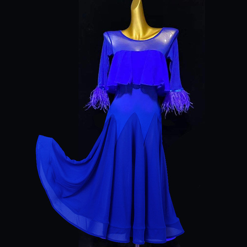 Royal blue ballroom dance dress with feather cuff sleeves and full circle skirt