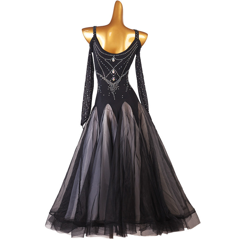 Back view of the black rhinestone ballroom dress showing the beaded back line