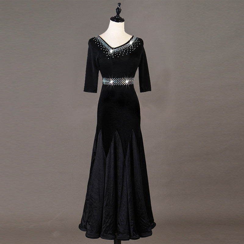 Black ballroom dance dress front view with fitted satin hip