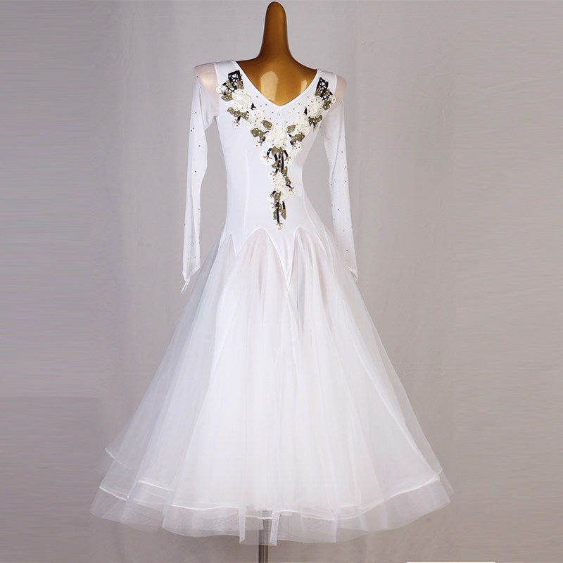 White floral applique ballroom dress front view with the tulle skirt hanging