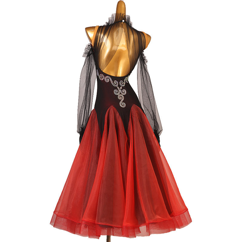 Back view of the black and red dress showing the silver scroll beading