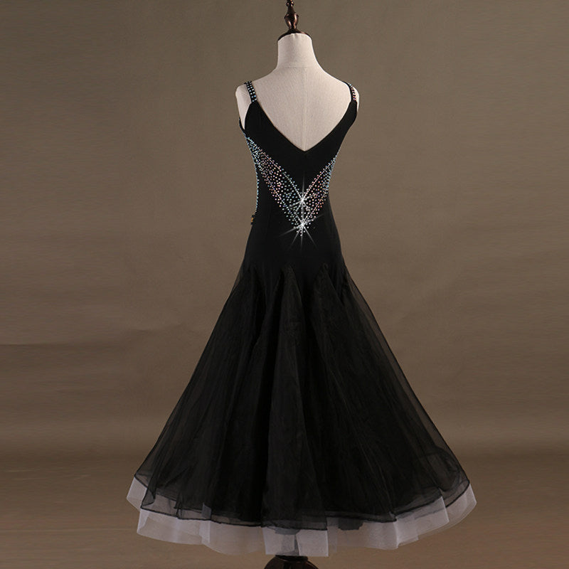 Black ballroom competition dress back view showing the open back