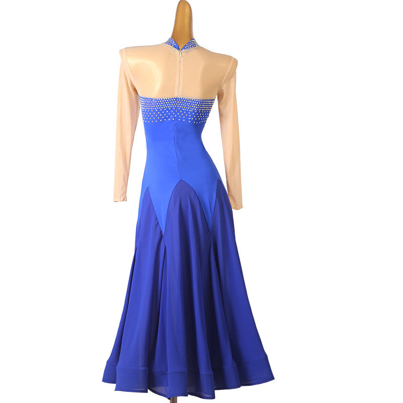 Royal blue illusion yoke ballroom dress seen from the back