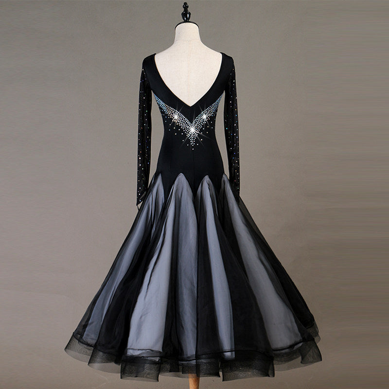 Black and white ballroom competition dress front view on mannequin