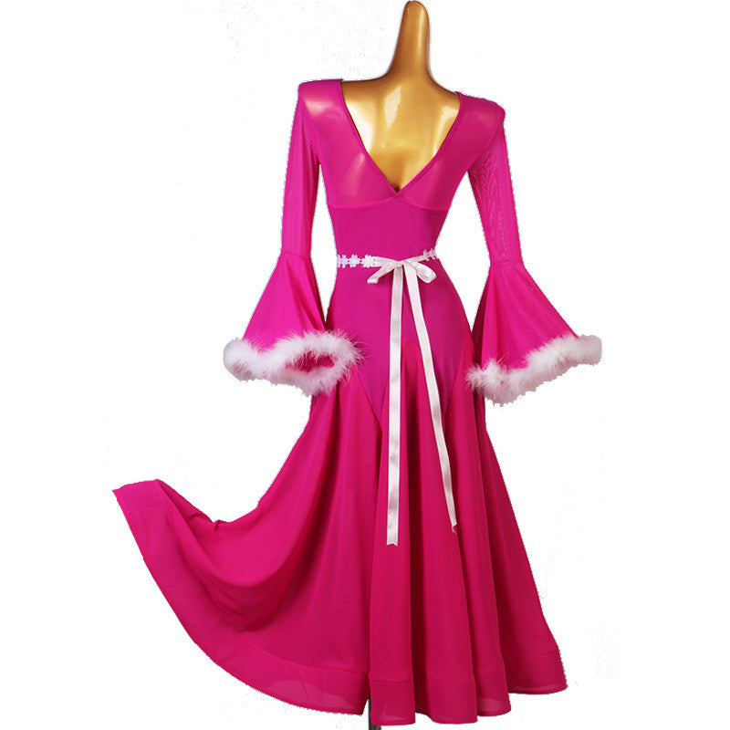 Back view of the hot pink dance dress showing the deep V and ribbon ties
