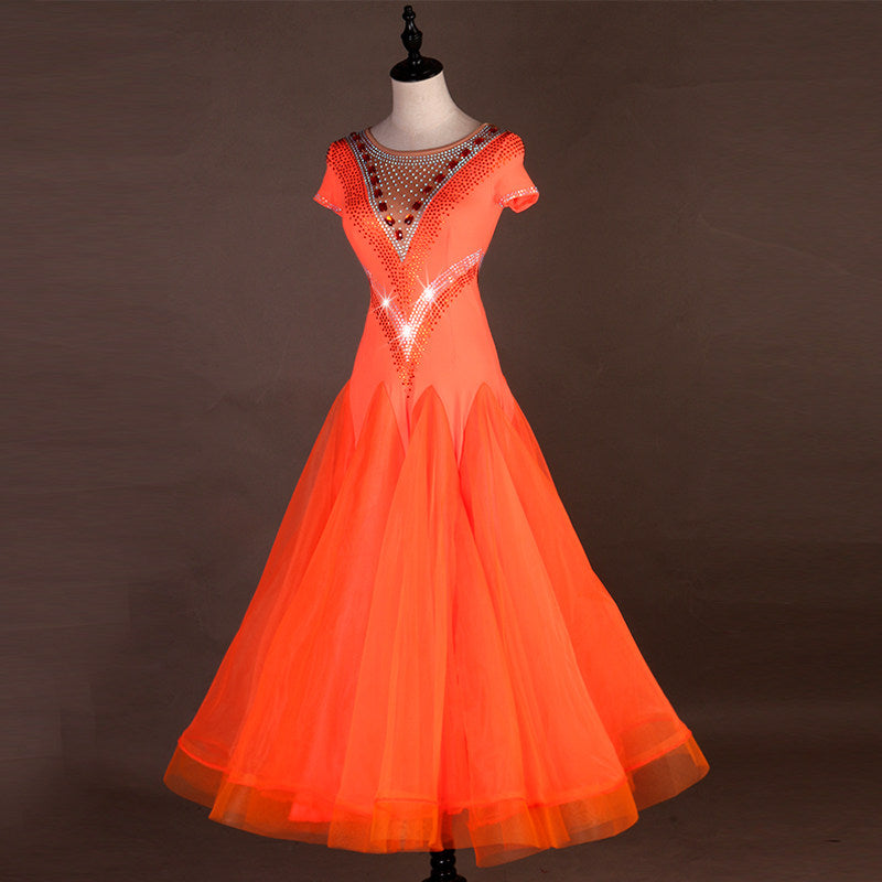 Orange ballroom dance dress front view with full circle organza skirt