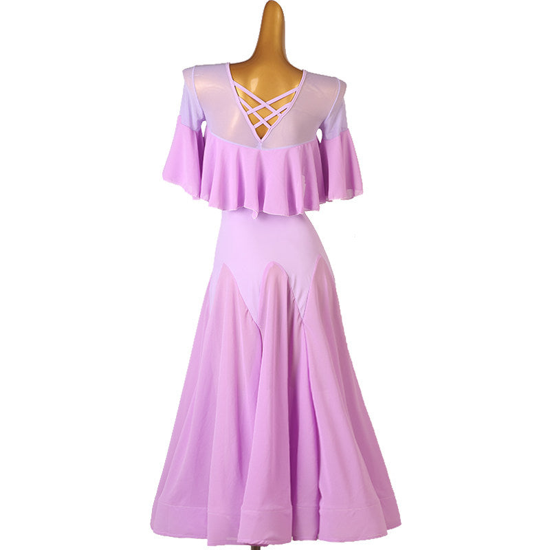 Lilac cape ruffle practice dress showing the criss-cross lacing at the front