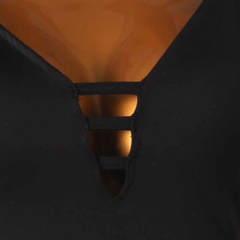 Close up of the three rung ladder trim at the point of the V neckline