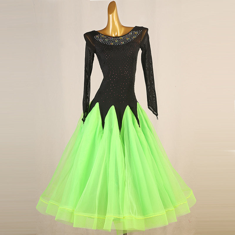 Black and green ballroom dance dress with the fringed mesh sleeves hanging
