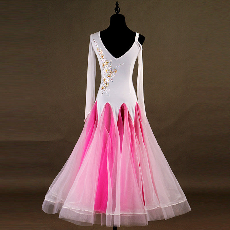 Pink and white ballroom dance dress on mannequin, embroidered bodice detail