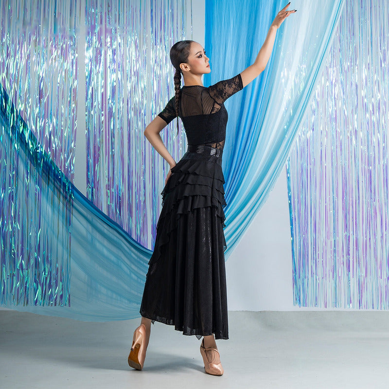 Full sweep of the black diagonal ruffle ballroom dance skirt in motion