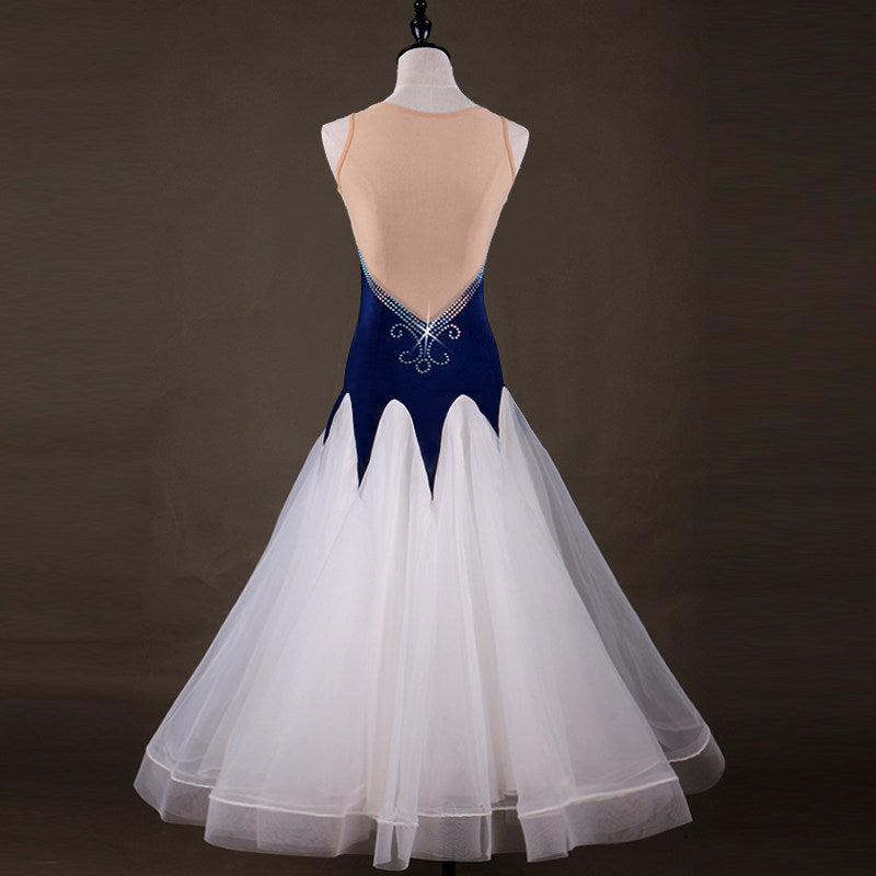 Navy ballroom gown back view showing the open back and tulle skirt