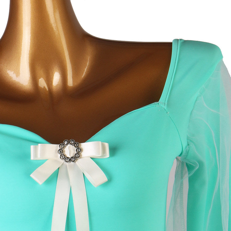 Close up of the ivory satin bow and crystal buckle at the sweetheart neckline