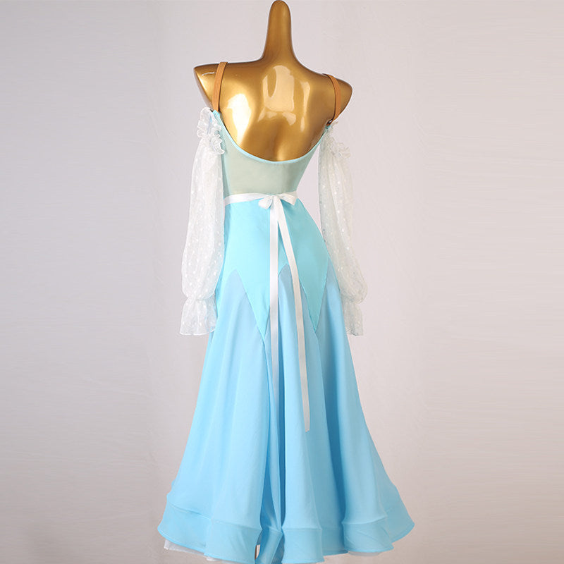 Light blue dance dress with the lace sleeves and satin sash seen from the front