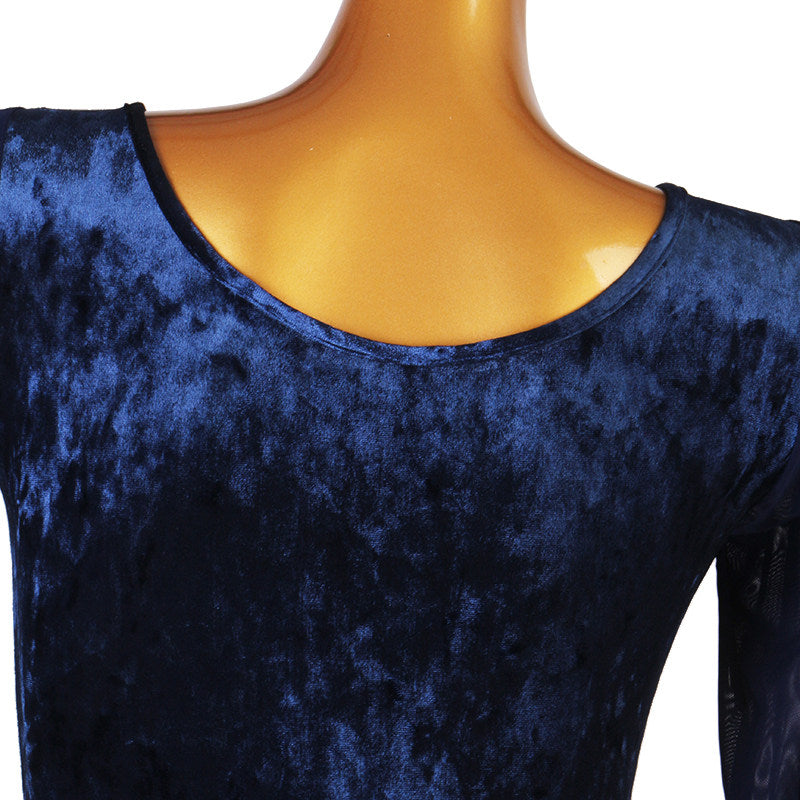 Close up of the crushed velvet texture at the scooped neckline