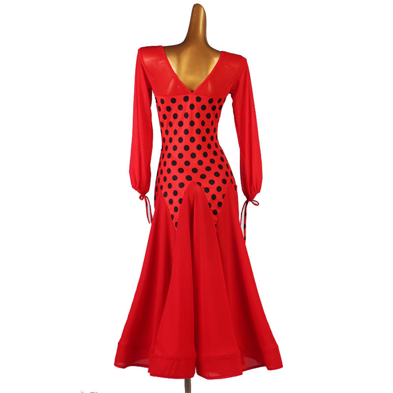Front view of the red dot ballroom dress showing the crossover V neckline