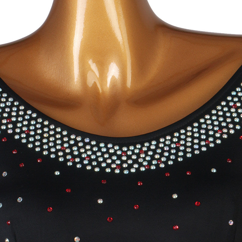 Close up of the clear and ruby rhinestone band around the scoop neckline