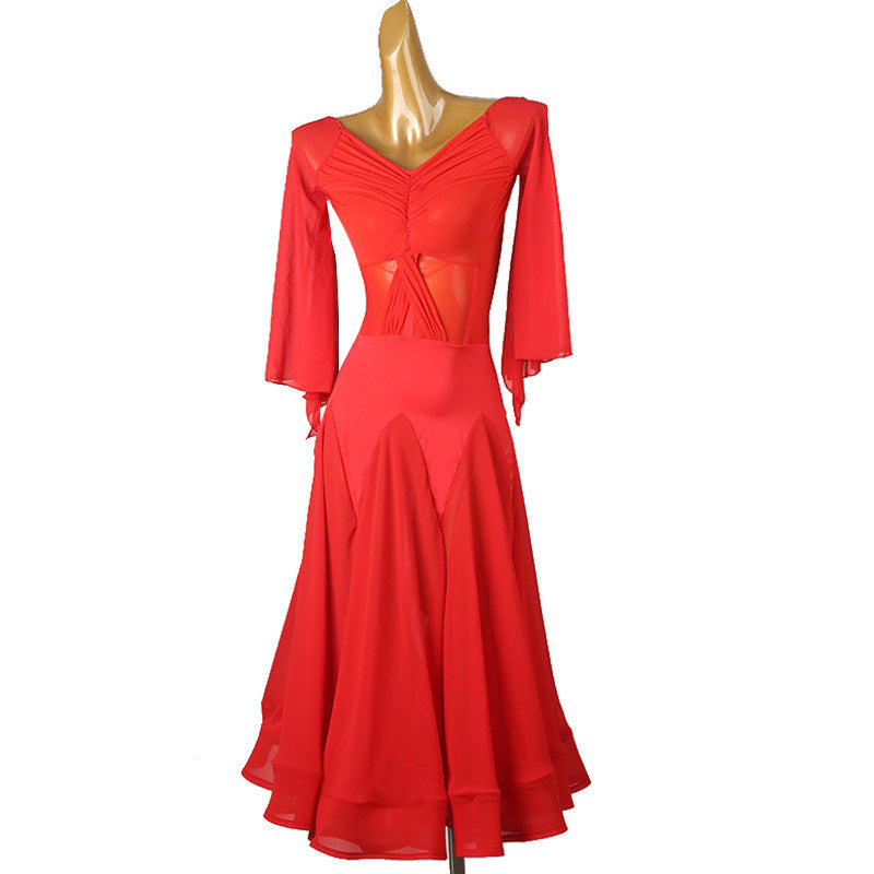 Red ballroom dance dress with the skirt panels falling to the floor