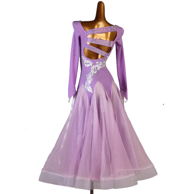 Lilac pearl applique ballroom dress with the organza skirt swept forward
