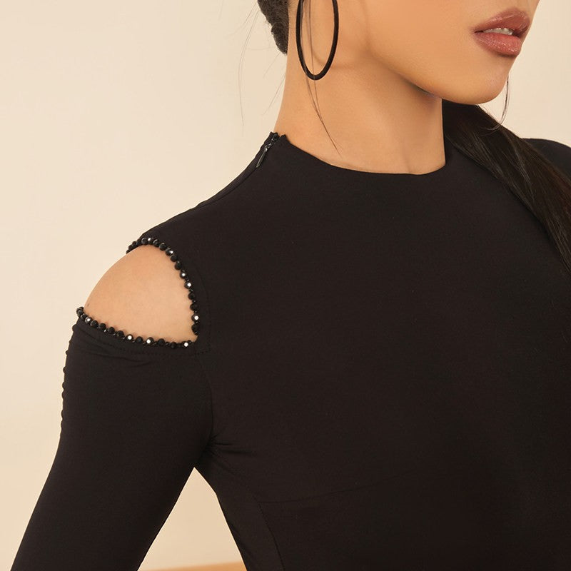 Black mock neck cutout leotard, close-up of the beaded shoulder cutout