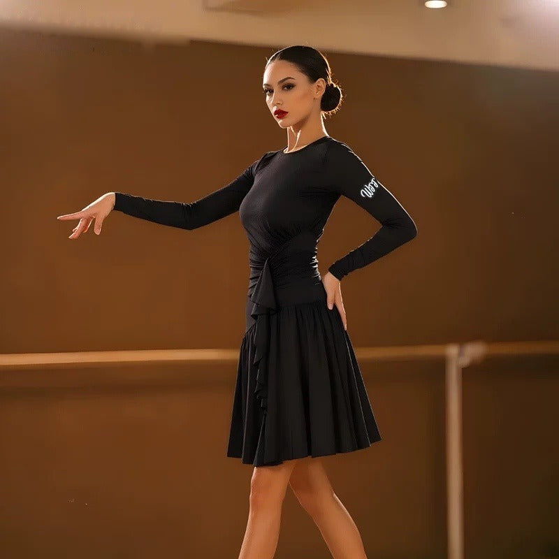 Black long sleeve latin salsa dance dress with a ruched waist and ruffle sash