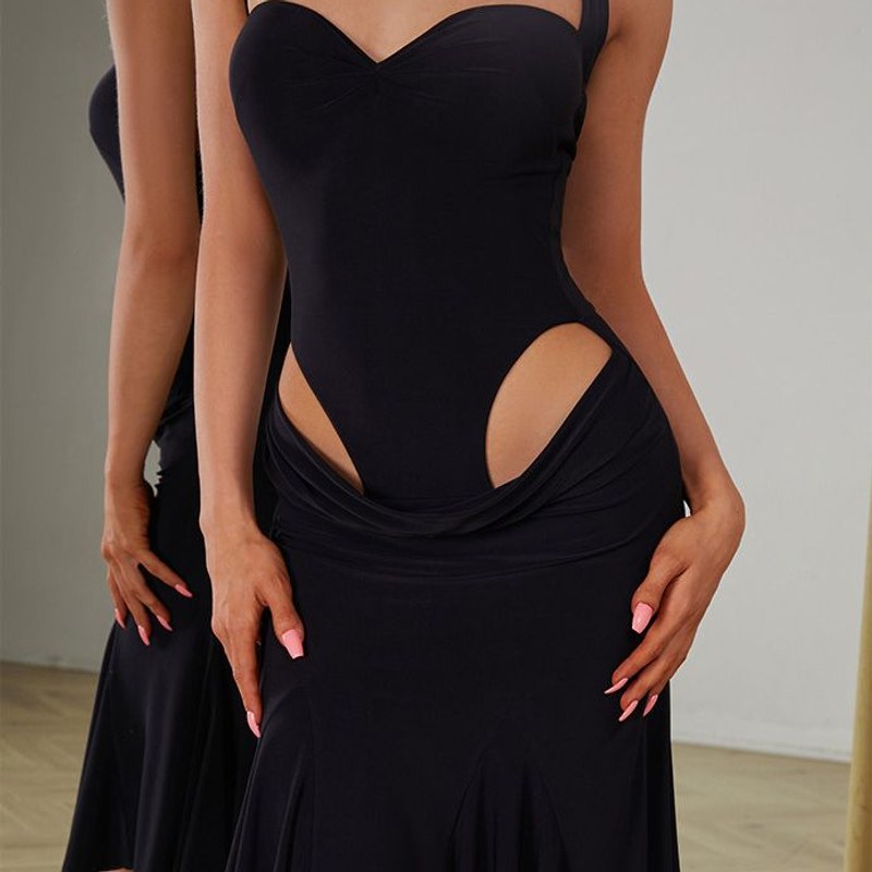 Black sweetheart bodice on a halter dance dress, close up
