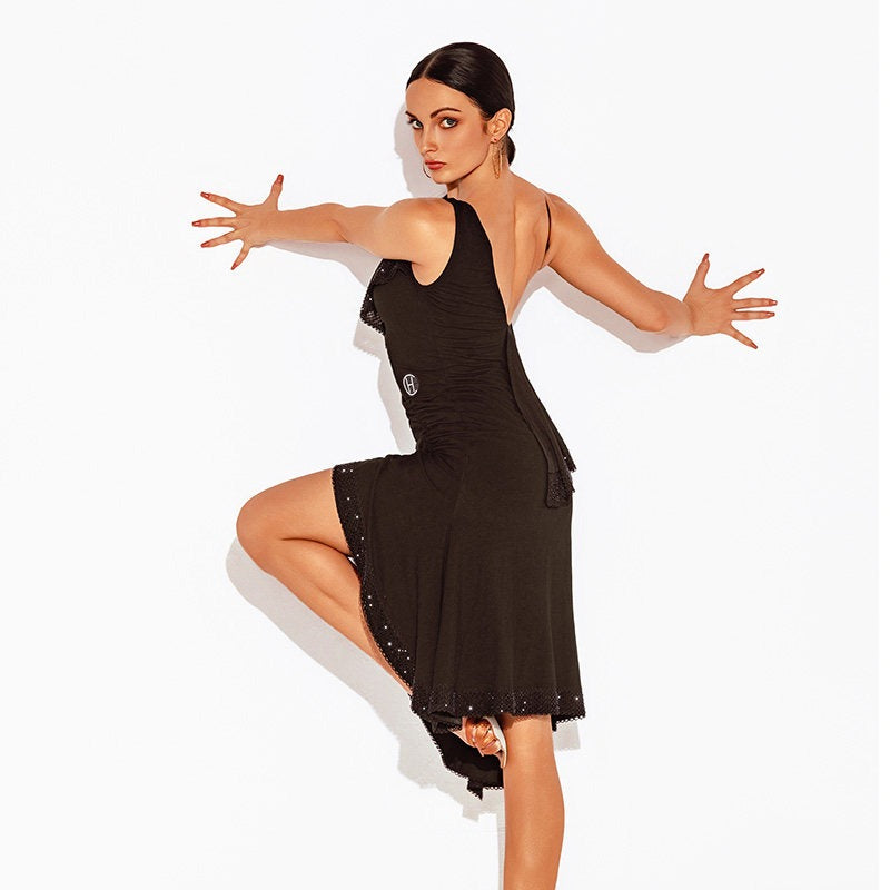 Black one shoulder Latin dance dress, open back pose