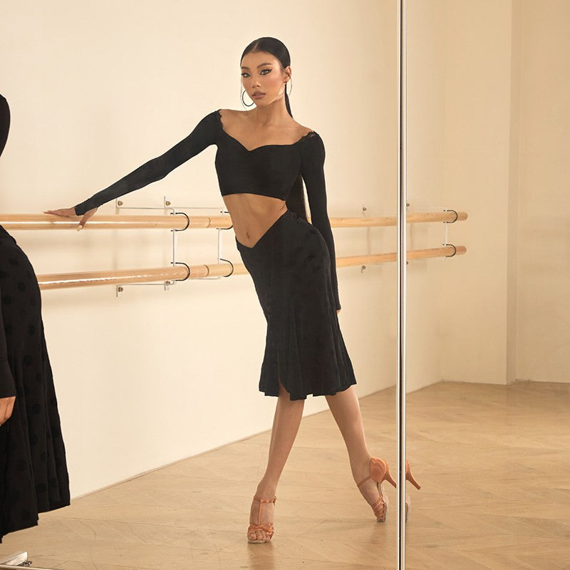 Black polka dot skirt, front view at the barre