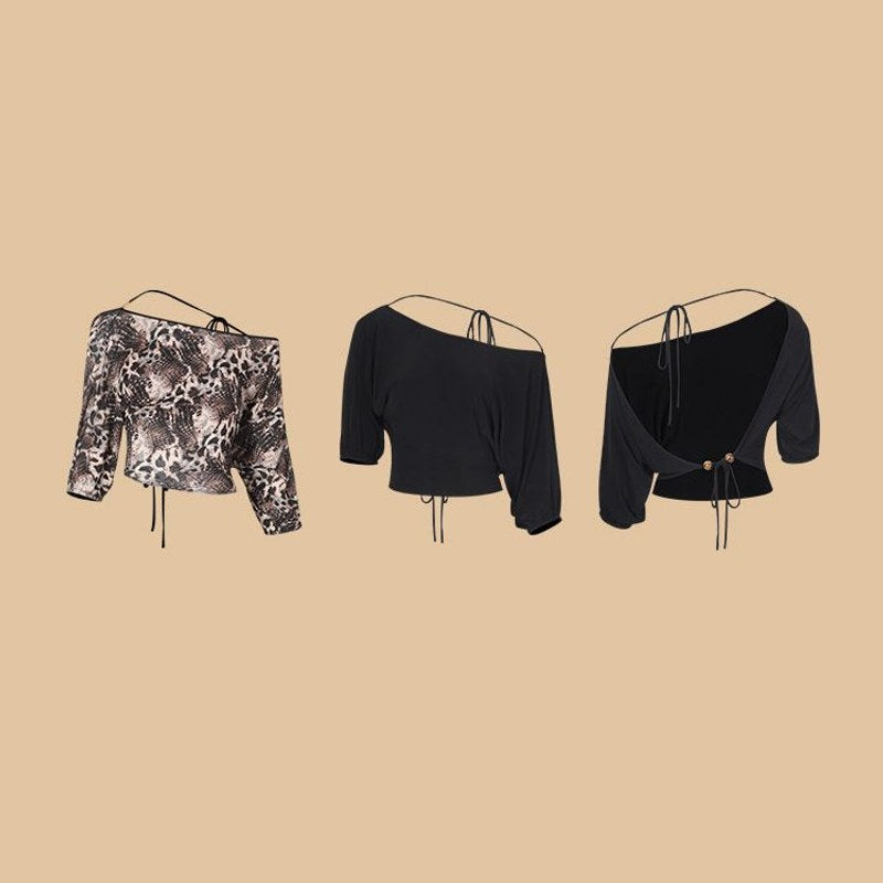 Snake Print, Black off shoulder Latin dance top, flat lay of both colours