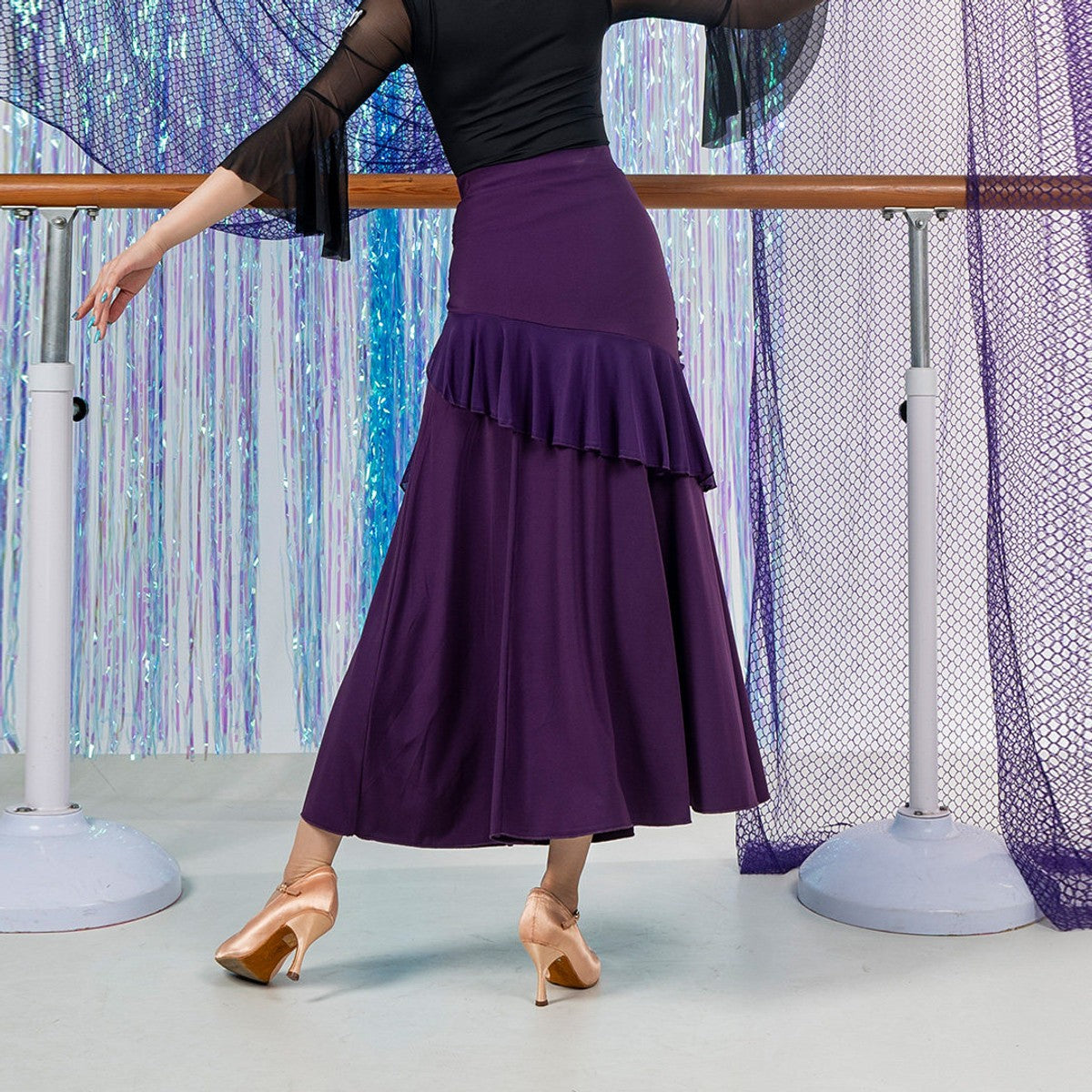 Purple ballroom dance skirt with side ruffle, back view