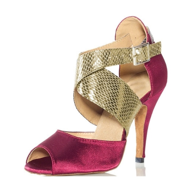 burgundy satin latin dance shoe for women with a wide gold snakeskin crossover strap, peep toe and stiletto heel