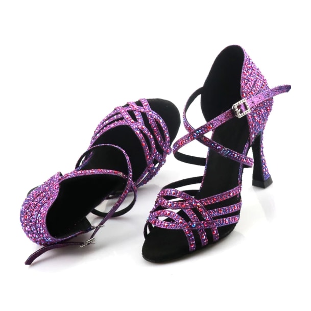 pair of purple glitter rhinestone latin dance shoes for women with strappy open toe and flared heels