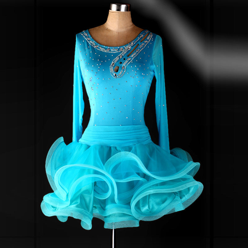 Turquoise rhinestone latin dance dress with long sleeves and turquoise organza ruffle skirt