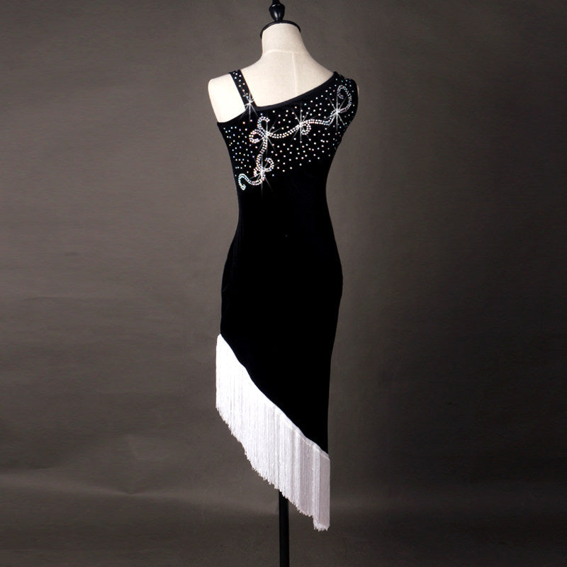 Black latin dance dress with white fringe hem shown from the front