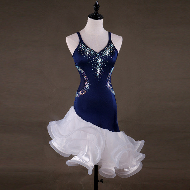 Navy velvet latin dance dress angled view showing the stoned hip curves