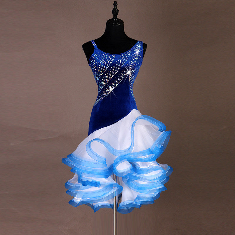 Blue velvet latin dance dress with diagonal crystal band and pale blue ruffle skirt