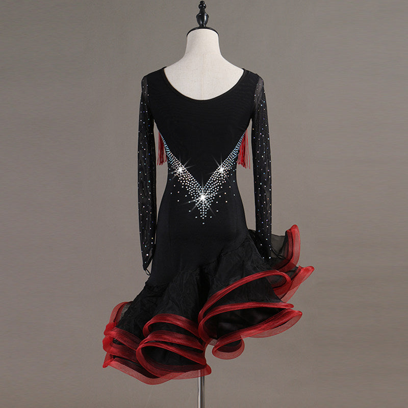 Black latin dance dress rear view showing the mesh back and red ruffle hem
