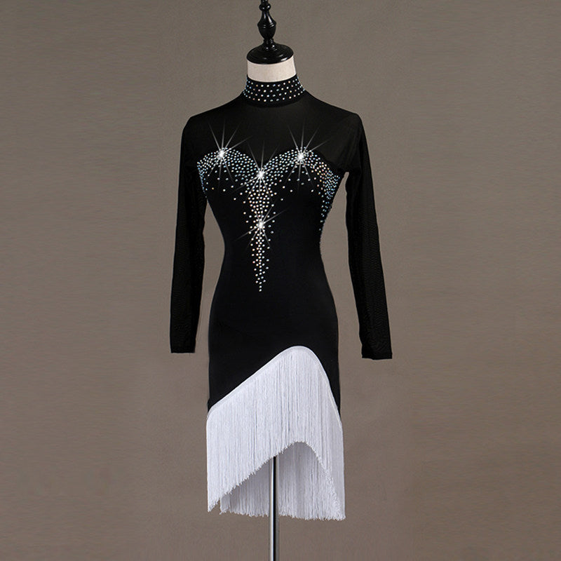Black latin dance dress angled view with the white fringe split open