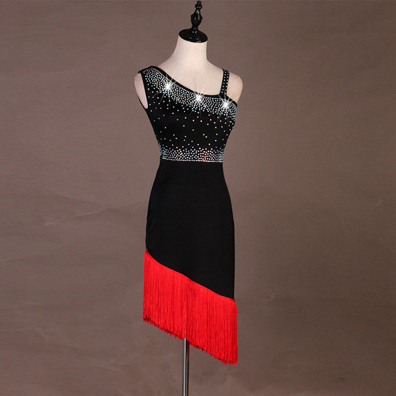 Black latin dance dress side view showing the red fringe on the diagonal